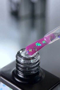 NAILSOFTHEDAY Party top 06 – przezroczysty top z holograficznymi choinkami, bez lepkiej warstwy, 10 ml.